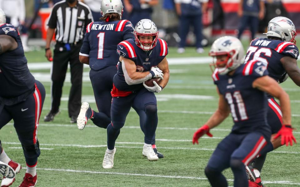 New England Patriots running back Rex Burkhead (34) runs the ball during the second half against the Las Vegas Raiders at Gillette Stadium.  - Paul Rutherford-USA TODAY Sports