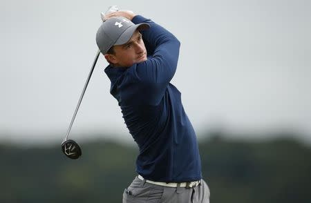 Paul Dunne of Ireland hits off the seventh tee during the third round of the British Open golf championship on the Old Course in St. Andrews, Scotland, July 19, 2015. REUTERS/Lee Smith -