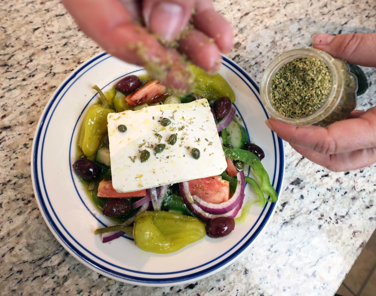 Authentic Greek salads are on the menu at Mediterranean Bar & Grill on County Street in Taunton on Thursday, April 25, 2024.