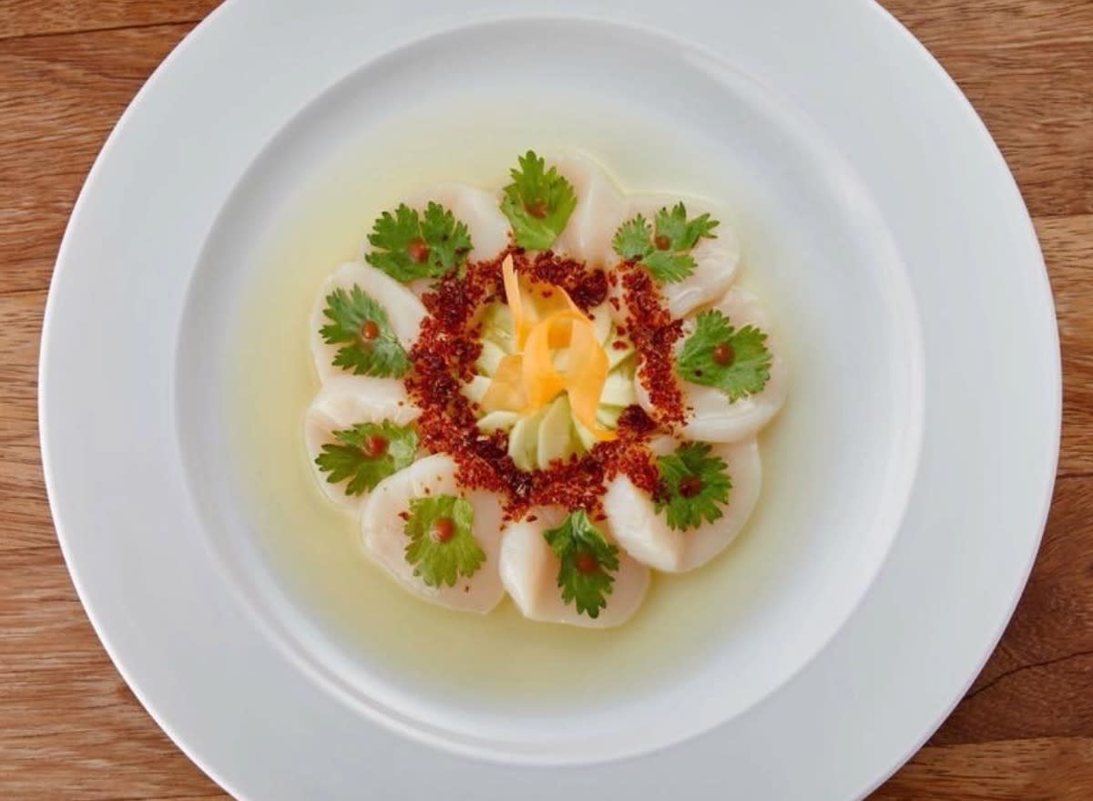 nobu scallops arranged on a plate.