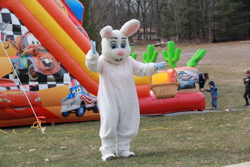 The Easter Bunny greets children at the Spring Egg-stravaganza in Vandalia.