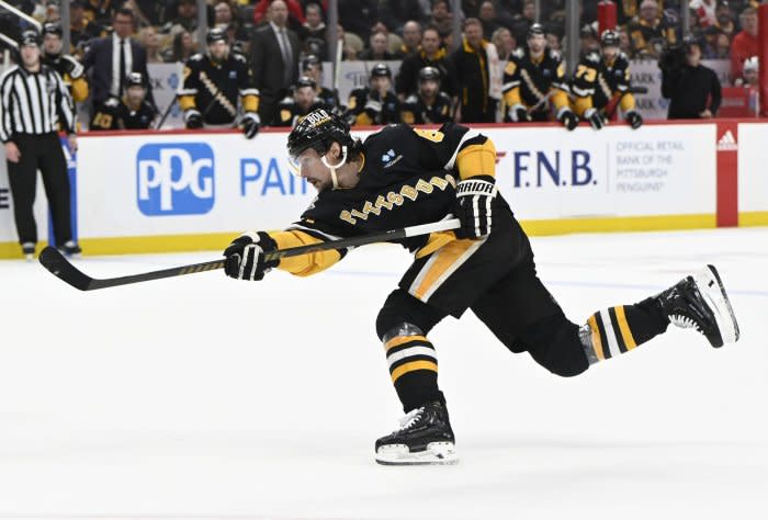 NHL: Pittsburgh Penguins defeat Detroit Red Wings in overtime