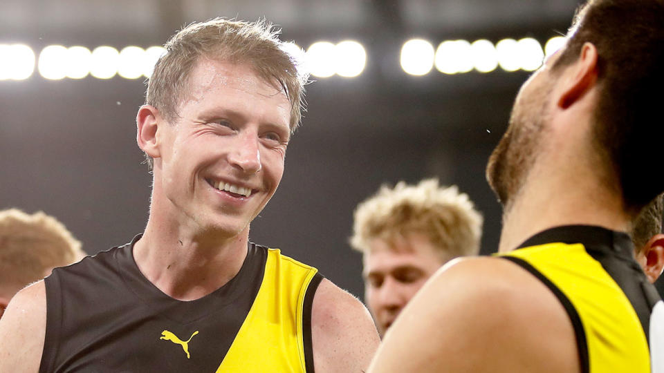 Pictured here, Richmond star Dylan Grimes has been the target of abuse from rival fans.