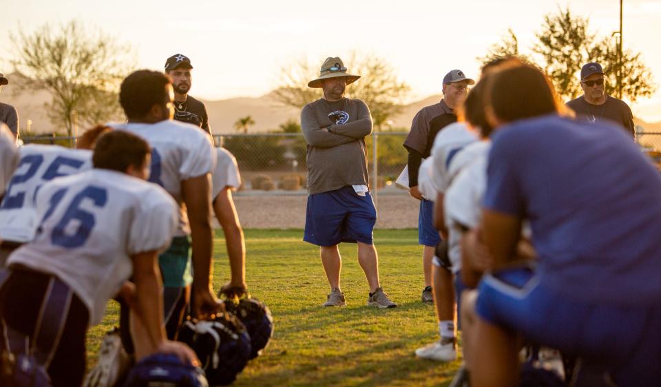 Aug 14, 2023; Surprise, AZ, USA; Head Coach Josh Goodloe speaks to players after practice on the Paradise Honors Middle School practice football field in Surprise on Monday, Aug. 14, 2023.