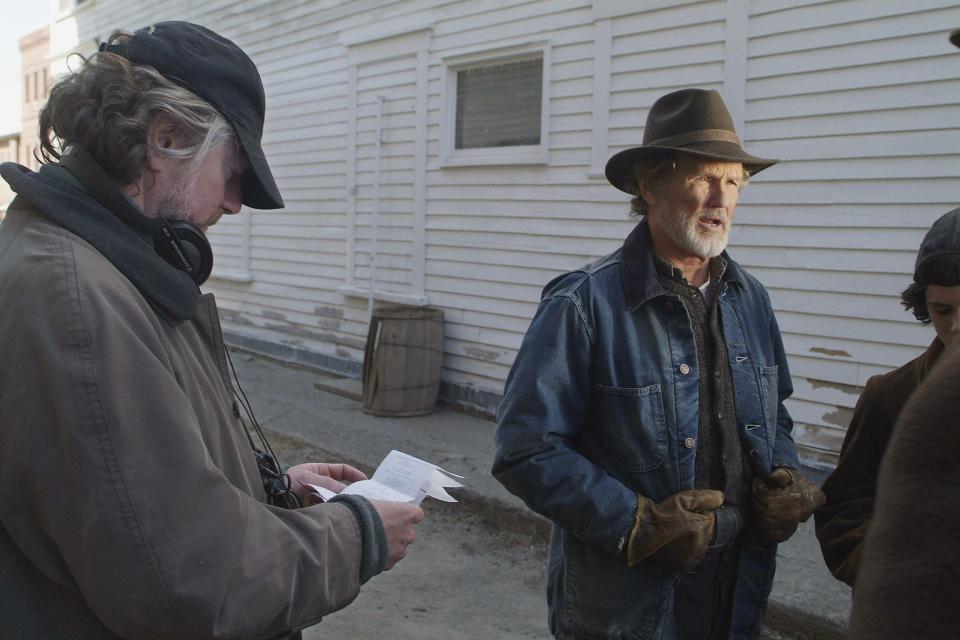 Actor Kris Kristofferson (right) plays Quebec Bill in Jay Craven's (left) film, "Disappearances," in St. Johnsbury in 2005.