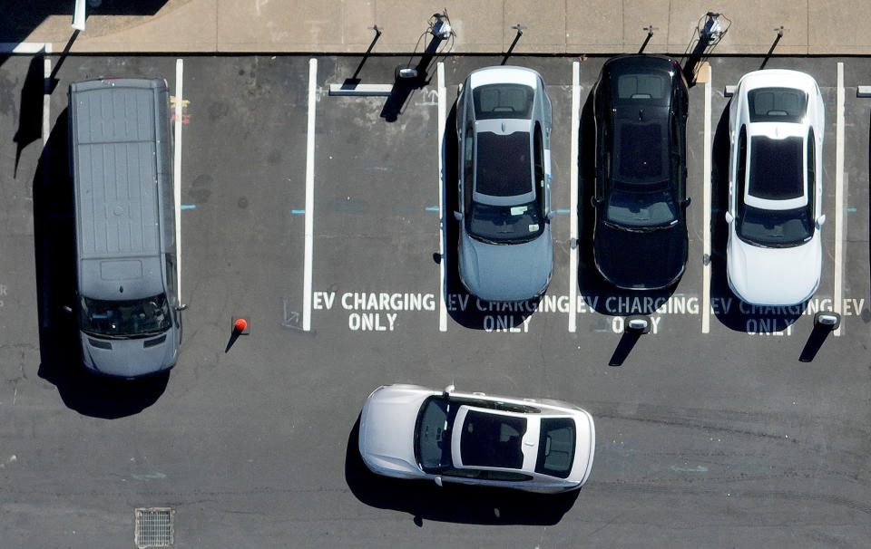 CORTE MADERA, CALIFORNIA - JULY 28: A Polestar electric car prepares to park at an EV charging station on July 28, 2023 in Corte Madera, California. Seven major automakers announced plans earlier this week to increase the number of high-powered electric vehicle chargers in the country with 30,000 new charging stations along highways and in urban areas. According to the Energy Department, there are currently an estimated  32,000 chargers across the country. (Photo by Justin Sullivan/Getty Images)