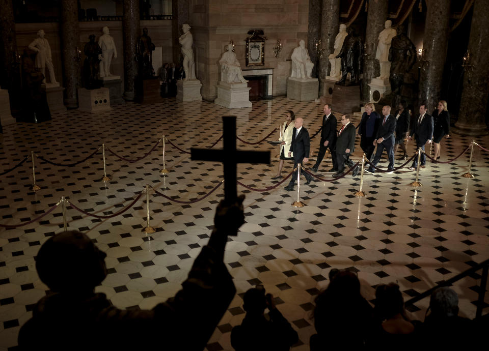 The group of lawmakers selected by House Speaker Nancy Pelosi to serve as the impeachment managers in the Senate trial against President Trump walk through the Capitol's National Statuary Hall to present physical copies of the impeachment articles to the Senate in Washington, D.C., on Jan. 15. | Gabriella Demczuk for TIME