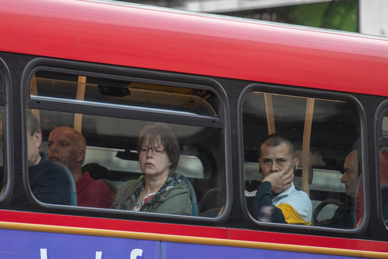 Commuters waiting for busses outside of Victoria Station due to the nation wide rail strike. (SWNS)