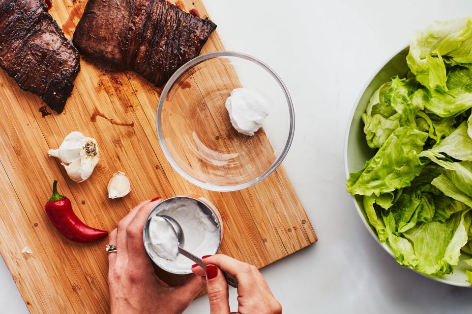 Don't shake the can! The cream at the top of that coconut milk is used to make the salad dressing.