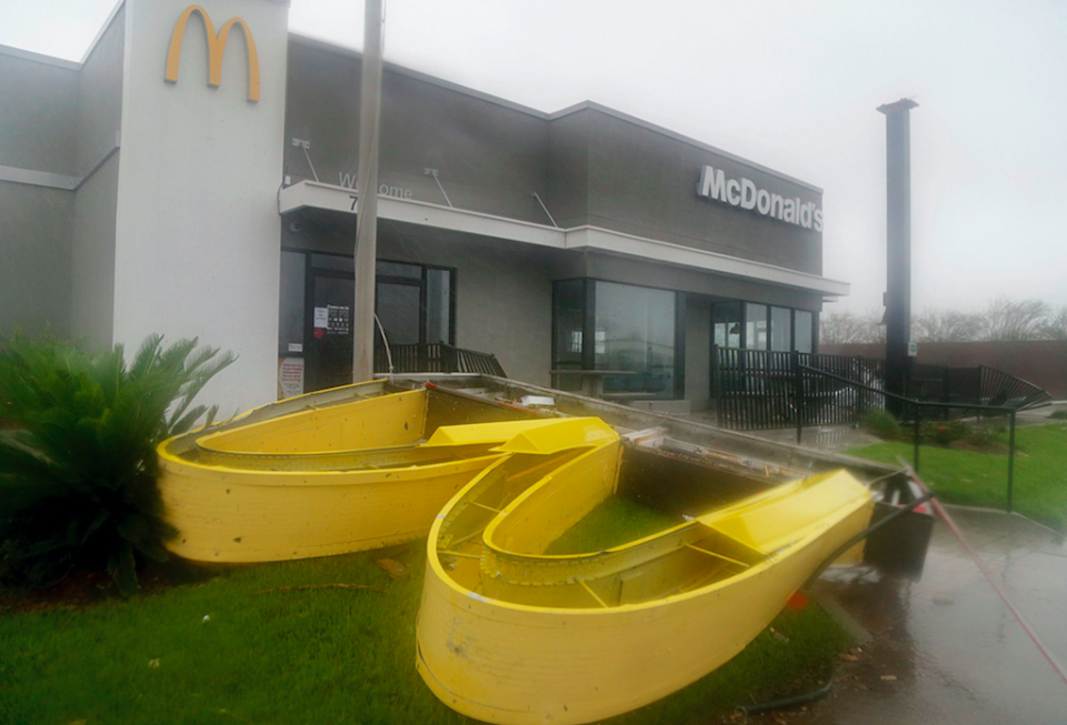 <em>A McDonald’s sign lies on the ground after being blown over by Michael (AP)</em>