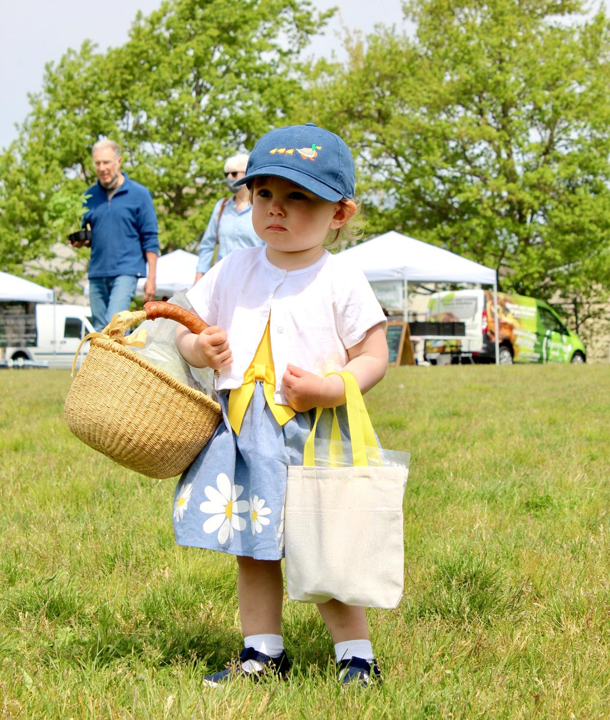 Young Ida is eager to get to the Aquidneck Growers Market at its new home at Embrace Home Loans.