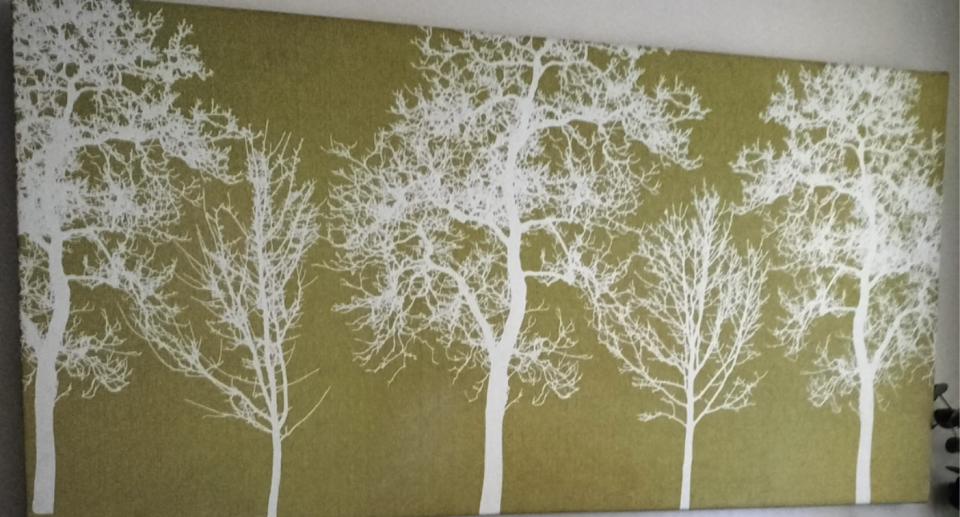 A canvas with a green tree pattern.