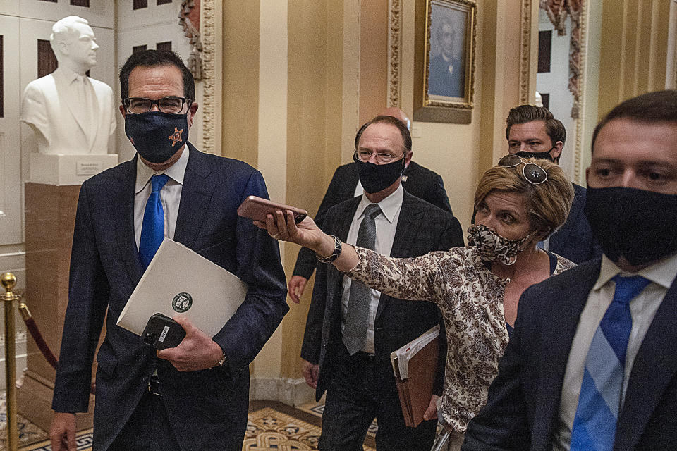Treasury Secretary Steven Mnuchin departs from the office of Senate Majority Leader Mitch McConnell at the U.S. Capitol on Wednesday. Mnuchin met with Democrats and Republicans about coronavirus relief legislation. (Photo: Tasos Katopodis via Getty Images)