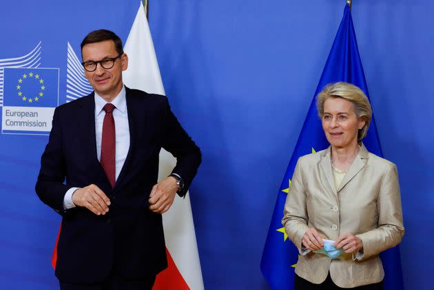 EU Commission President Ursula von der Leyen (R) welcomes Poland's Prime Minister Mateusz Morawiecki (L) as he arrives for a bilateral meeting in Brussels on July 13, 2021. (Photo by PASCAL ROSSIGNOL / POOL / AFP) (Photo by PASCAL ROSSIGNOL/POOL/AFP via Getty Images) (Photo: PASCAL ROSSIGNOL via Getty Images)