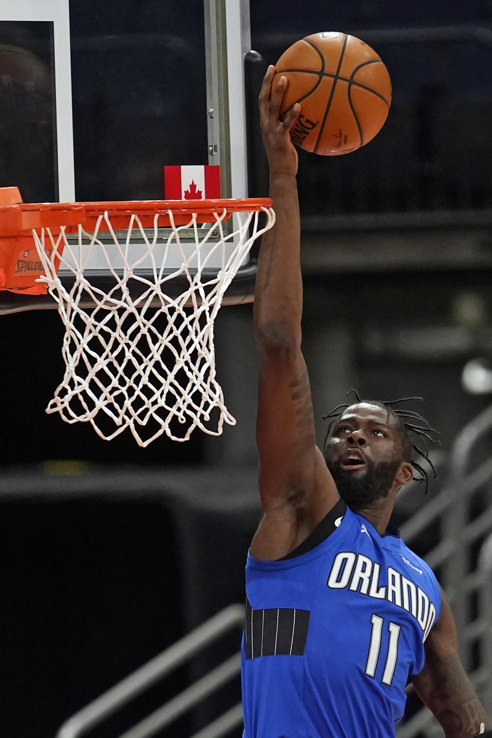 Orlando Magic forward James Ennis III (11) goes up for a shot during the first half of an NBA basketball game against the Toronto Raptors Sunday, Jan. 31, 2021, in Tampa, Fla. (AP Photo/Chris O'Meara)