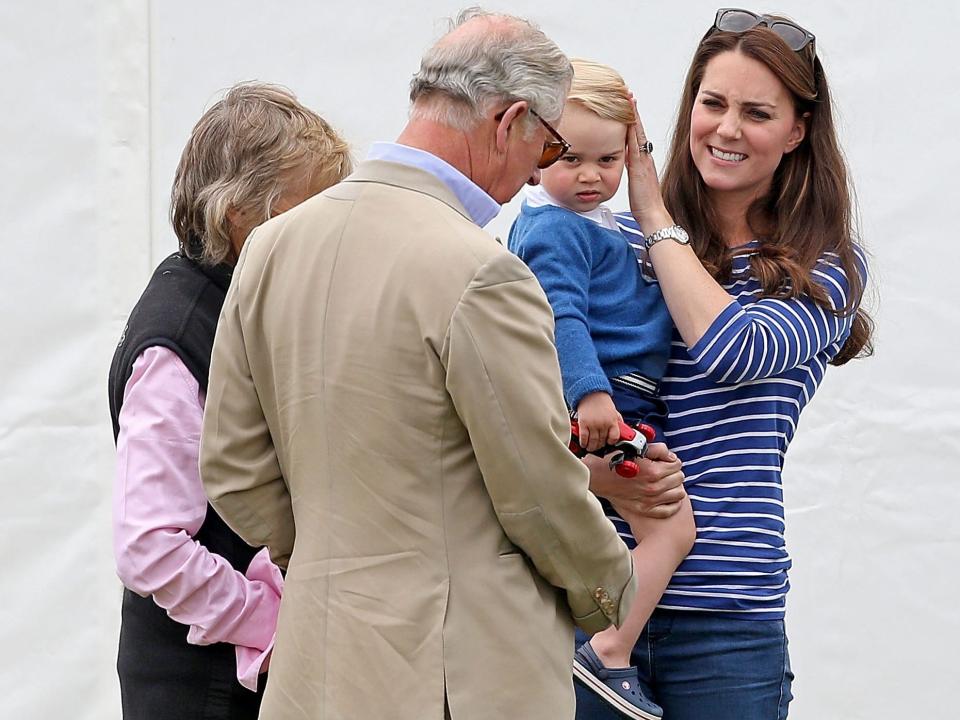 Prince Charles talks to Kate Middleton and Prince George in 2015