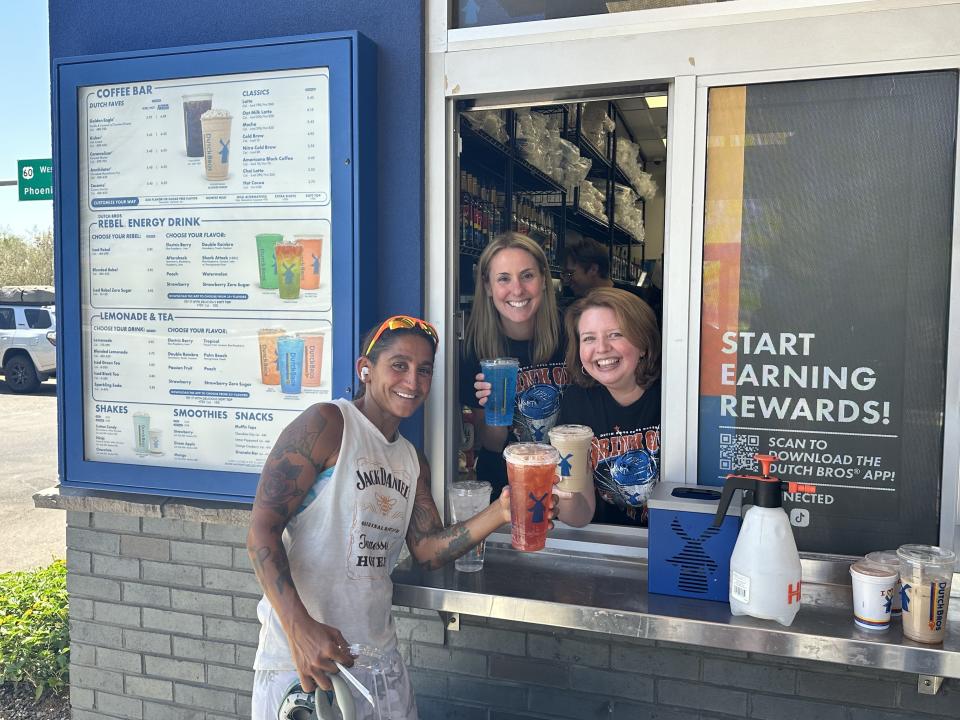 On the left, frequent customer Ivanca Jones, Tana Davila, Dutch Bros CMO who was currently undergoing her training in the middle and Dutch Bros CEO Christine Barone on the right. (Taken by Yahoo Finance)