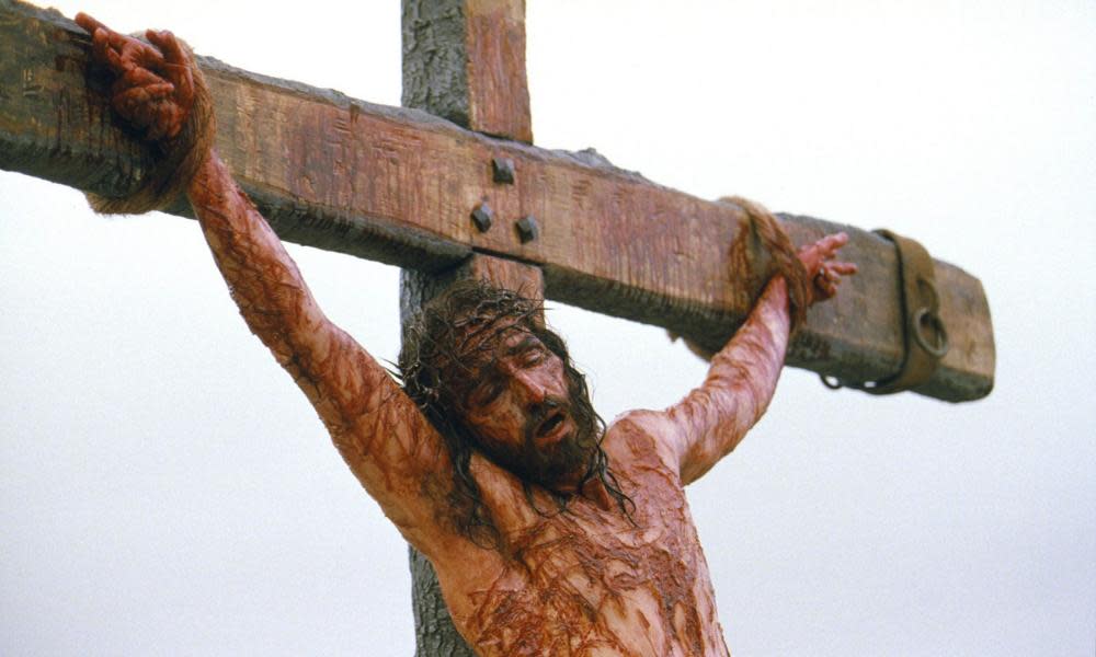 Actor Jim Caviezel portrays Jesus on the cross in a scene from the film The Passion of The Christ