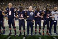 <p>Head coach John Fox of the Chicago Bears links arms with players during the singing of the national anthem before the game against the Green Bay Packers at Lambeau Field on September 28, 2017 in Green Bay, Wisconsin. (Photo by Jonathan Daniel/Getty Images) </p>