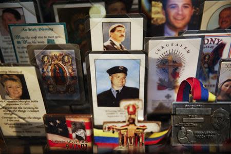 Blessing memorial cards are seen in the historical exhibition section of the National September 11 Memorial & Museum during a press preview in New York May 14, 2014. REUTERS/Shannon Stapleton