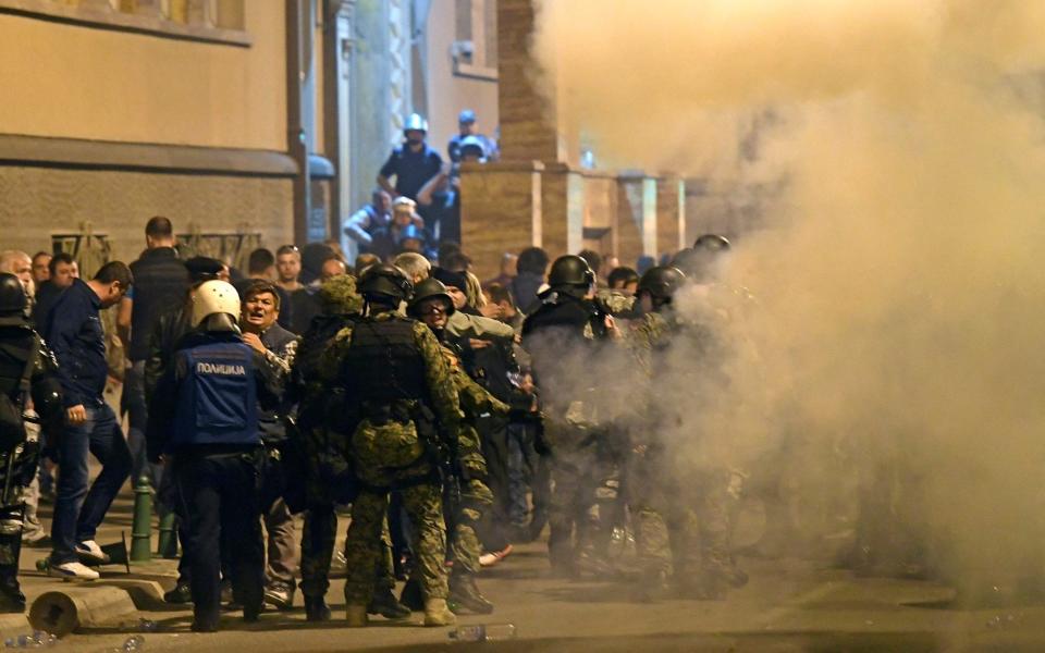 Protesters storm the parliament in Skopje - Credit:  GEORGI LICOVSKI/EPA