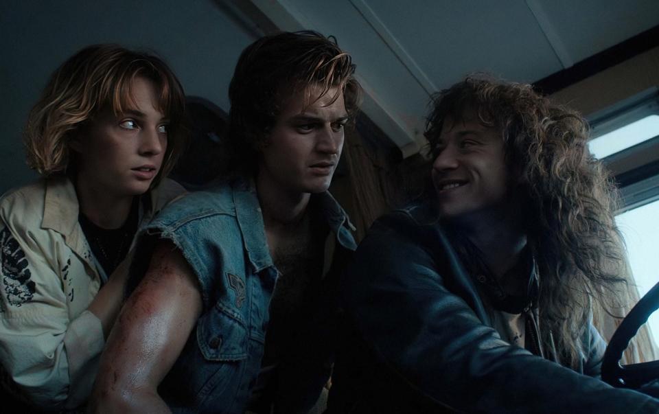 Maya Hawke as Robin Buckley, Joe Keery as Steve Harrington and Joseph Quinn as Eddie Munson - Netflix