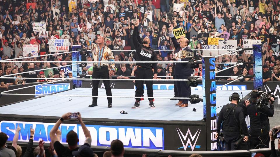 The Rock (left) and Roman Reigns (centre) will team up at WrestleMania 40 (WWE via YouTube)