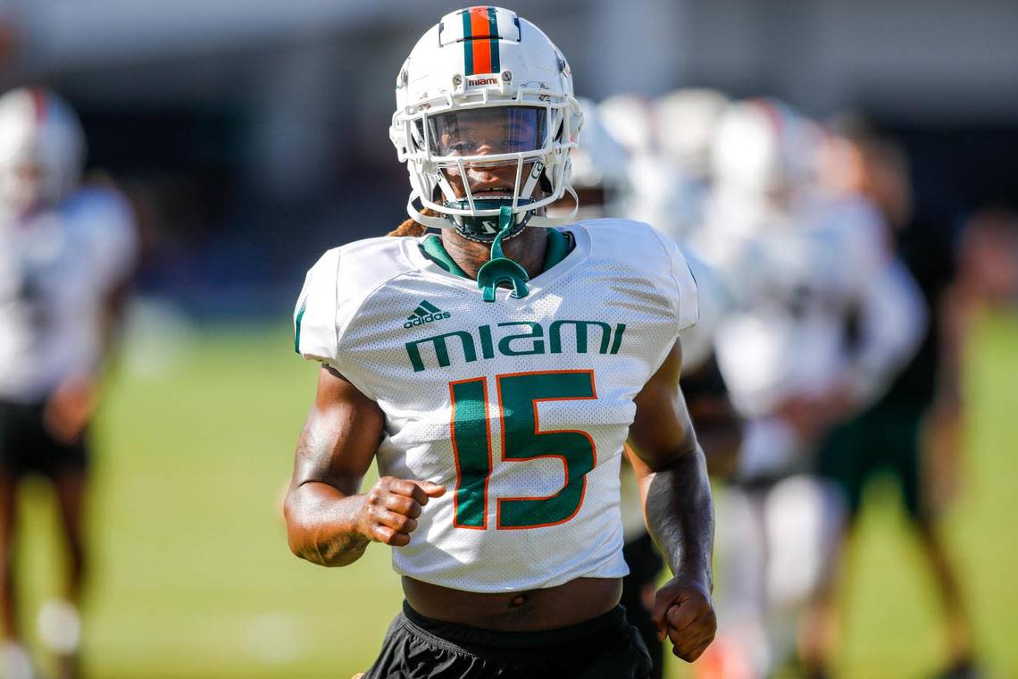 Miami Hurricanes safety Avantae Williams (15) runs on the field during football practice at the University of Miami campus in Coral Gables, Florida, Tuesday, August 23, 2022.
