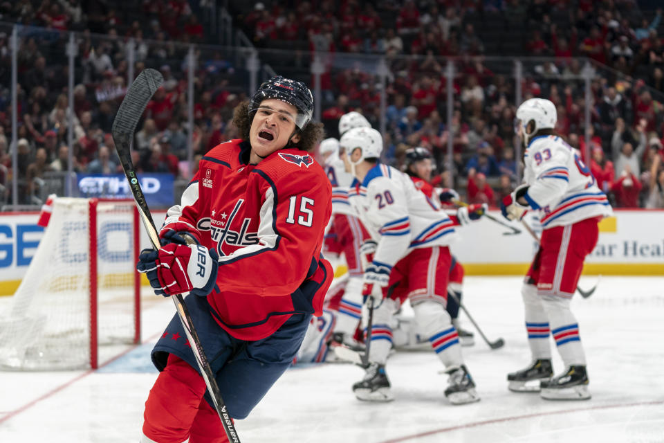 Washington Capitals left wing Sonny Milano (15) celebrates after scoring during the first period of an NHL hockey game against the New York Rangers, Saturday, Dec. 9, 2023, in Washington. (AP Photo/Stephanie Scarbrough)