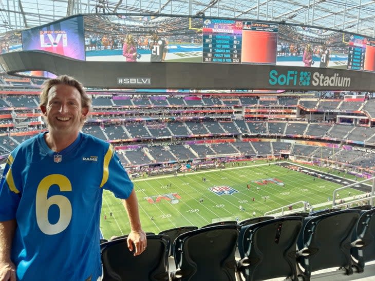 <span class="article__caption">Matt White, sport director at BikeExchange-Jayco, on game day at Super Bowl LVI.</span>