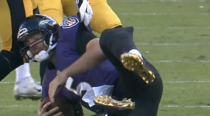That's not Joe Flacco's knee exploding — it's his brace, thankfully. (CBS screenshot)
