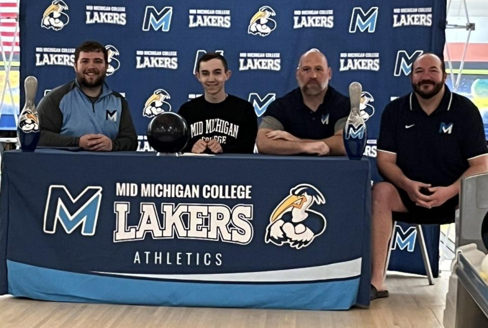 Alongside Mid Michigan College coaches, Cheboygan senior Cole Swanberg officially signed to play for the Laker men's bowling program next season during a ceremony held at Cheboygan's Spare Time Lanes on Thursday.