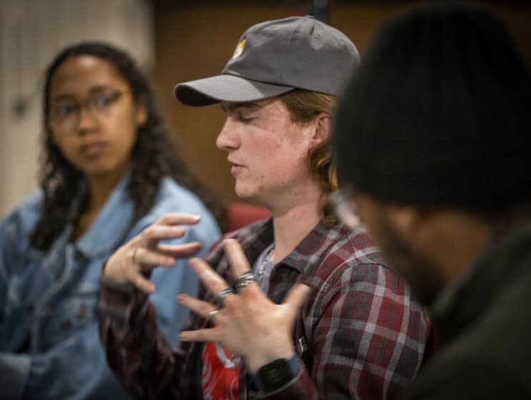 La Mirada, CA - March 20: Mahlia St. Cyr, left, Brandon Hall, center, and Jaloni Wilson participate in a discussion with the St. Thomas Collective at the United Methodist Church of La Mirada Sunday, March 20, 2022. A group of students and former students who attend Biola University in La Mirada are meeting off campus to talk about the questions they have about their faith. Their group is called the St. Thomas Collective. (Allen J. Schaben / Los Angeles Times)