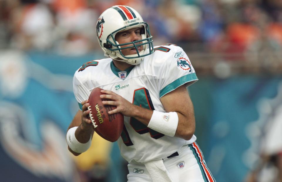 MIAMI - NOVEMBER 2:  Quarterback Brian Griese #14 of the Miami Dolphins looks down field to pass against the Indianapolis Colts November 2, 2003 at Pro Player Stadium in Miami, Florida. The Colts won 23-17. (Photo by Eliot J. Schechter/Getty Images)