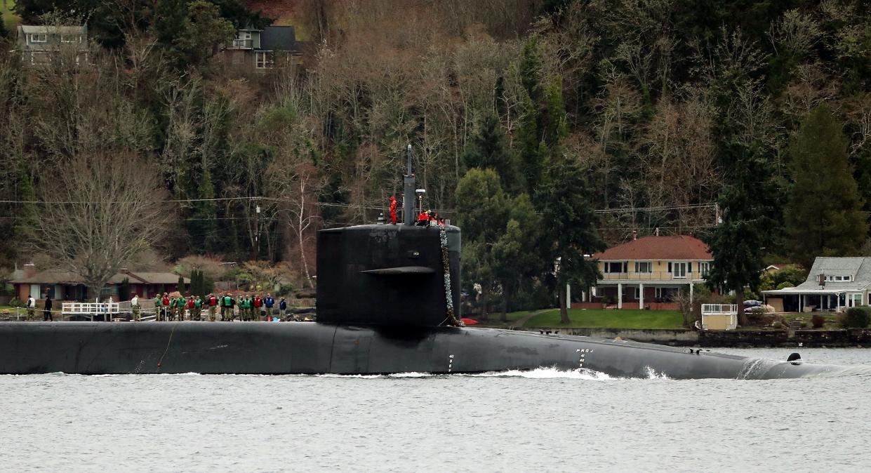 The USS Ohio passes Bremerton's Bachmann Park as it heads for Naval Base Kitsap-Bremerton on Monday.