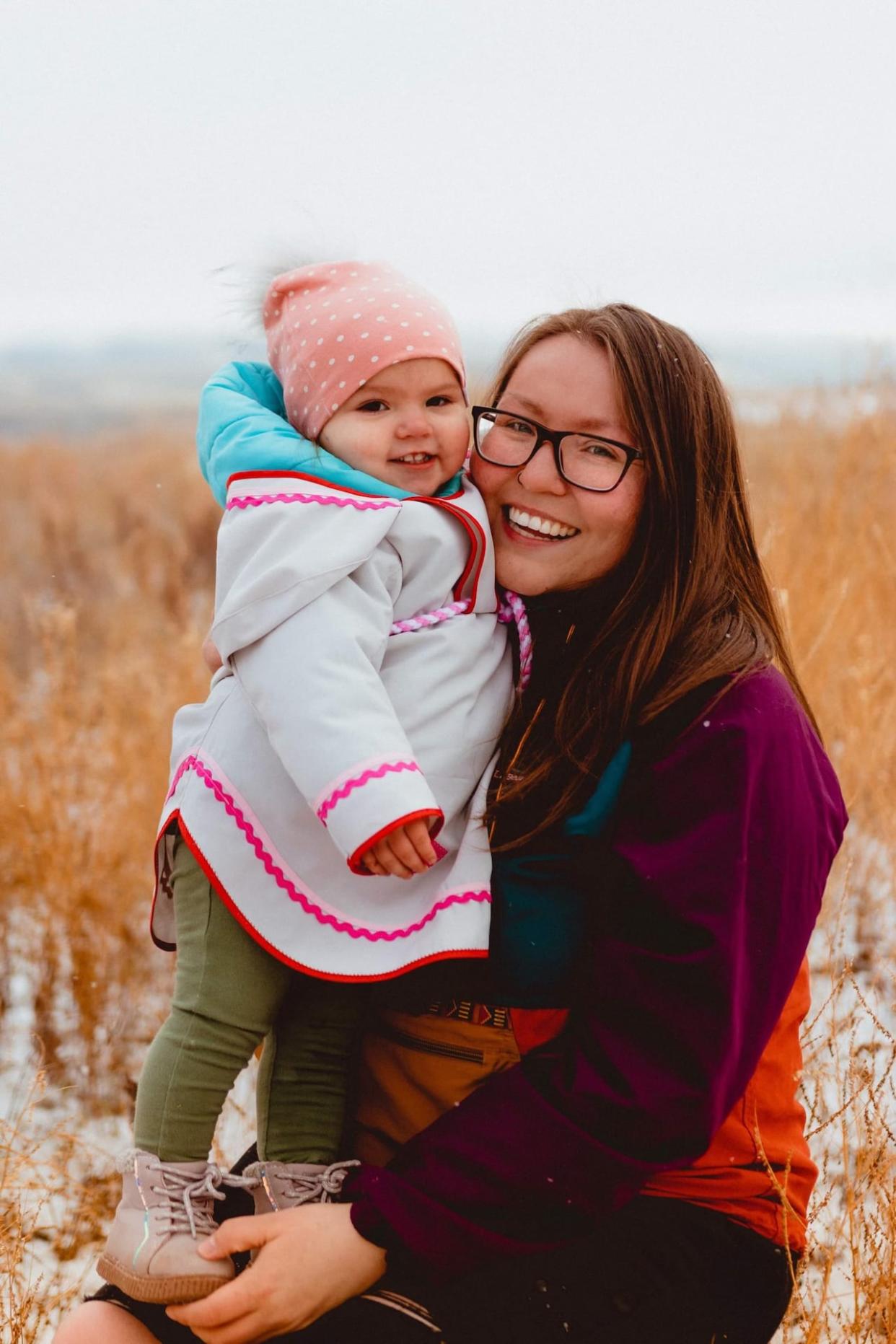 Alyssa Carpenter, leading founder and project director of the Western Arctic Youth Coalition, says she started the organization shortly before her daughter, Scarlett Niko Millar Carpenter, was born. Alyssa was recently named 'Young Inuk Woman of the Year' by Pauktuutit Inuit Women of Canada. (Submitted by Alyssa Carpenter - image credit)