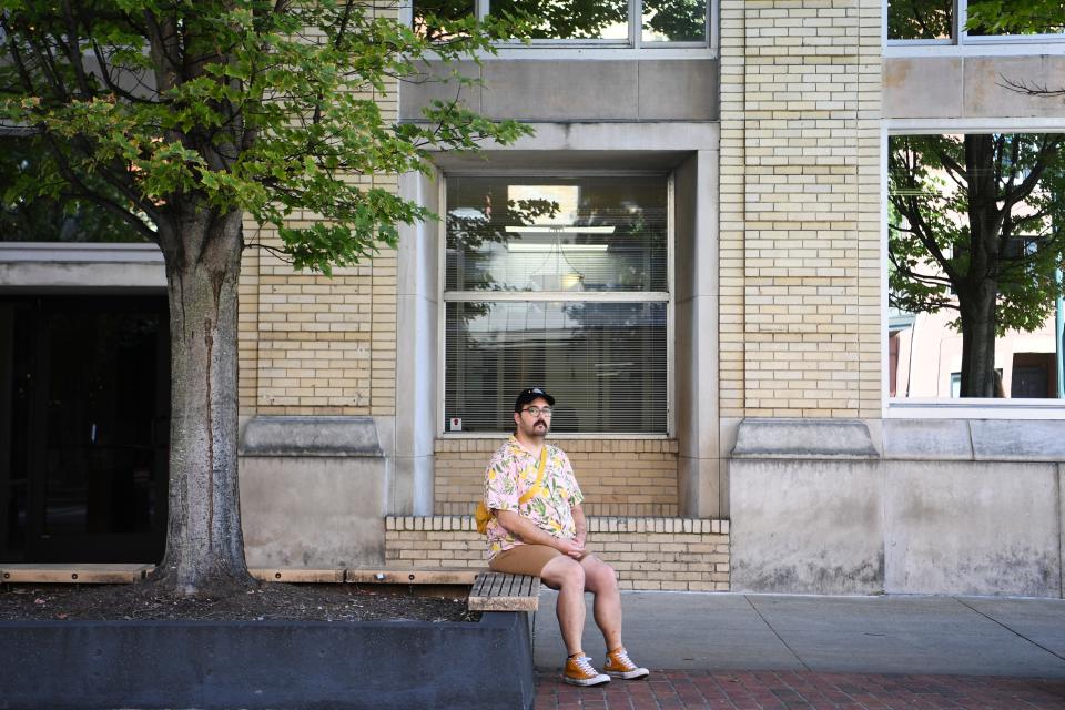 Local victims rights advocate Ben Putland is seen in front of the condo building that Mikayla Evans fell five stories from, in 2020, Thursday, Oct. 12, 2023. Evans is now fighting to have her voice heard in the case of an alleged serial rapist that has rocked the town of Johnson City with allegations of police corruption, two federal lawsuits and a scathing audit that exposed systemic failures in the way police investigated sexual assaults.