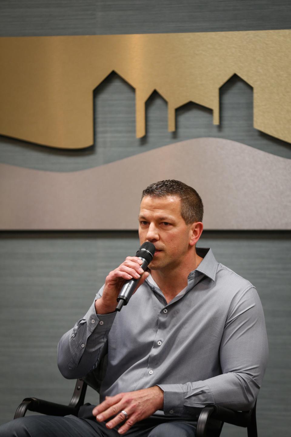 Springfield school board candidate Chad Rollins answers questions Thursday at a forum hosted by the Springfield Area Chamber of Commerce.