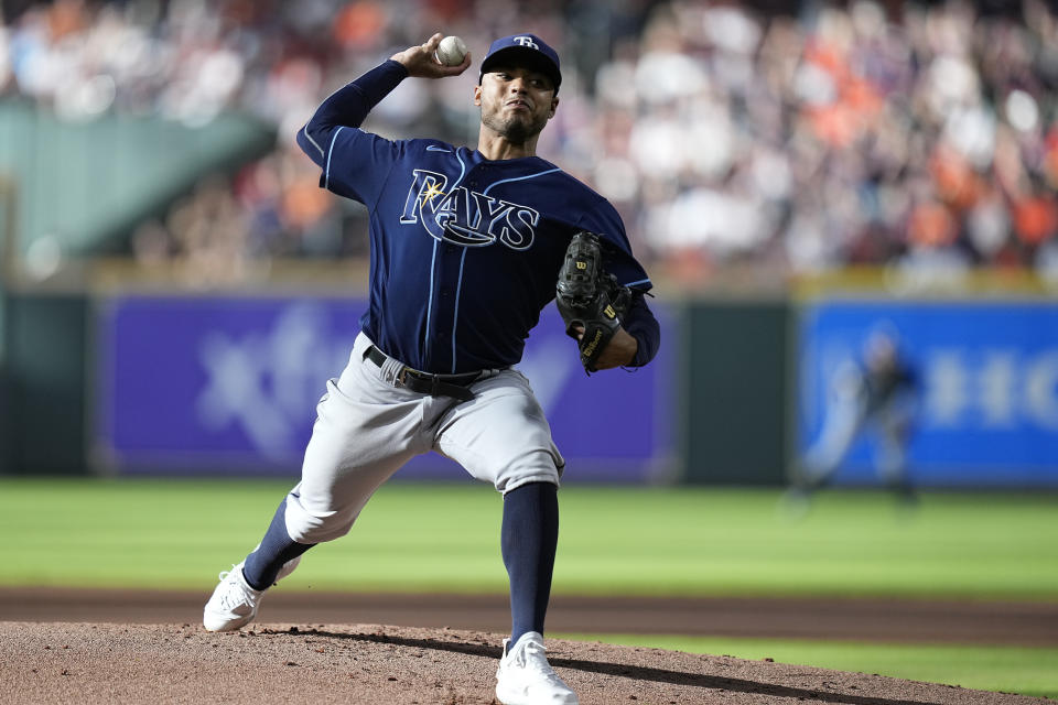 Tampa Bay Rays starting pitcher Taj Bradley delivers to a Houston Astros batter during the first inning of a baseball game Saturday, July 29, 2023, in Houston. (AP Photo/Kevin M. Cox)