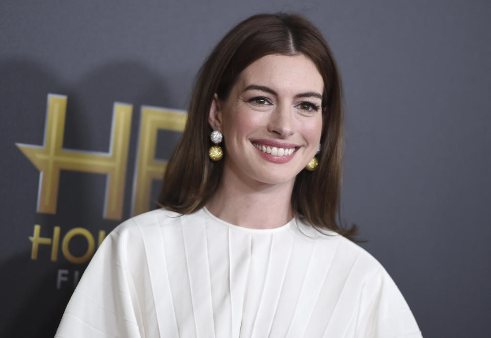 Anne Hathaway arrives at the Hollywood Film Awards in November 2018 at the Beverly Hilton Hotel. The actress said she plans to stop drinking for the next 18 years. (Photo: Jordan Strauss/Invision/AP)