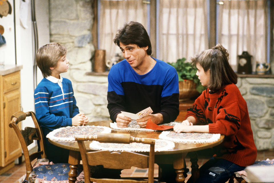 Tony Danza as Tony Micelli, Alyssa Milano as Samantha, and Danny Pintauro as Jonathan in the 1984 sitcom 