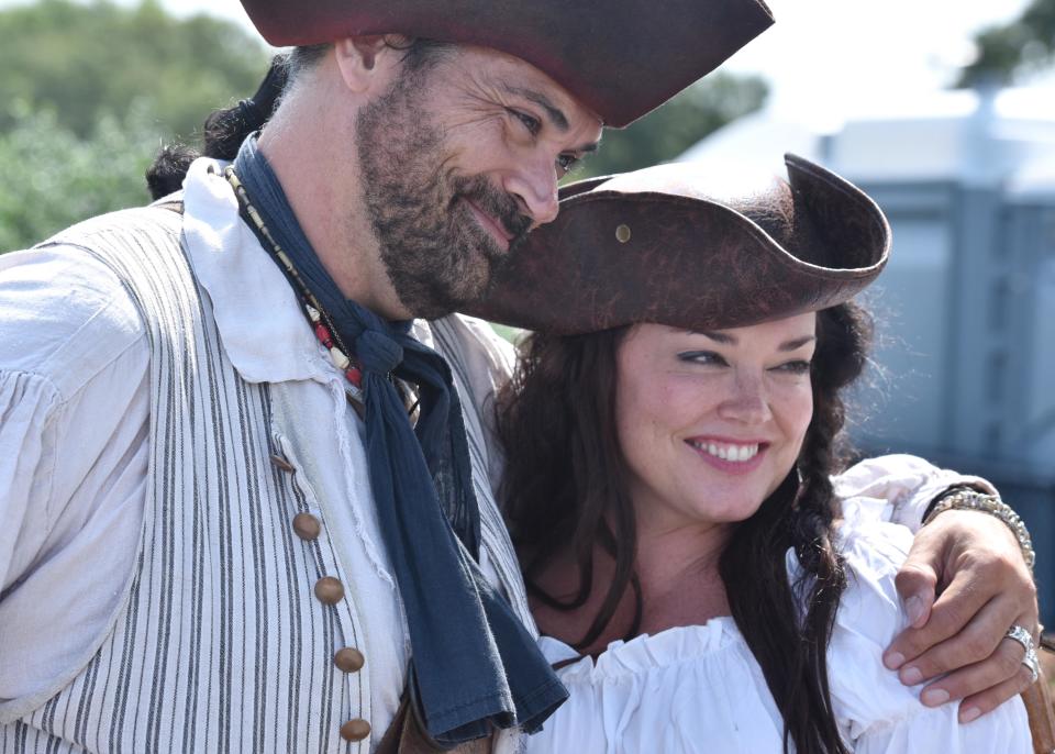 Buck Kinnear and Molly Gales make the rounds for visitors on the first day of the 2021 Pirate Festival. Steve Heaslip/Cape Cod Times