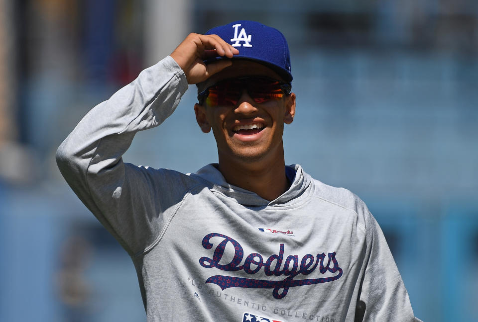 LOS ANGELES, CA - JULY 04:  Cole Roberts, 17 year old son of manager Dave Roberts #30 of the Los Angeles Dodgers, takes ground balls before the game against the Pittsburgh Pirates at Dodger Stadium on July 4, 2018 in Los Angeles, California.  (Photo by Jayne Kamin-Oncea/Getty Images)