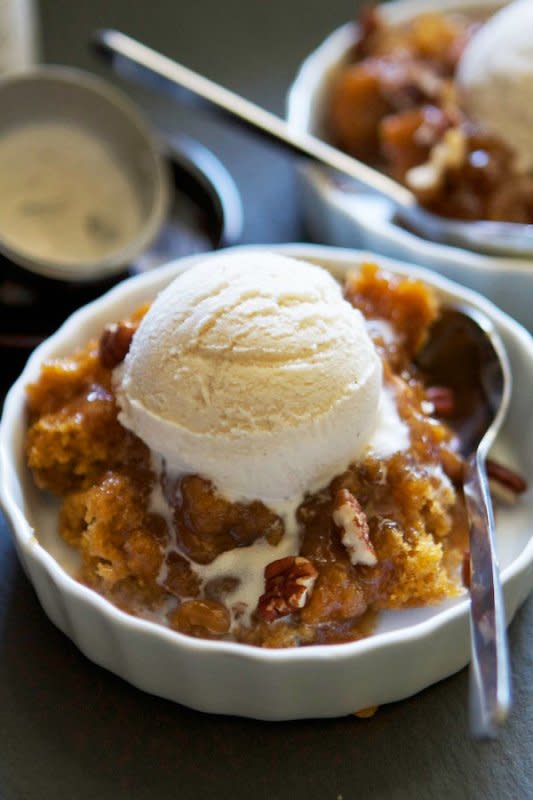 <p>Lauren's Latest</p><p>Pumpkin pecan cobbler is the ultimate fall dessert with cake on the top and hot caramel sauce on the bottom!</p><p><strong>Get the recipe: <em><a href="https://laurenslatest.com/pumpkin-pecan-cobbler/" rel="nofollow noopener" target="_blank" data-ylk="slk:Pumpkin Pecan Cobbler;elm:context_link;itc:0;sec:content-canvas" class="link rapid-noclick-resp">Pumpkin Pecan Cobbler</a></em></strong></p>