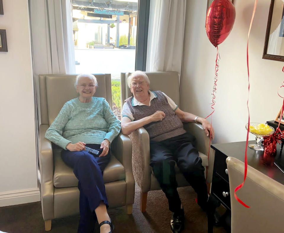 This is the moving moment a devoted wife surprised her dementia-stricken husband by moving into his care home after a month apart - because she 'can't live without him'. Pensioner Kenneth Meredith, 96, walked through the door with his zimmer-frame and broke down in tears when he saw wife Betty Meredith, 91, sitting down in front of him. Seconds later he rushes over to his wife of 71-years, who is seen sitting at a table for a make-shift date night, decorated with heart shaped balloons and roses. With The Platters' 1954 hit 'Only You', playing in the background, the couple share a long hug, after spending five weeks apart. The pair were heartbroken after Kenneth moved into Bourn View Care Home, Birmingham, five weeks ago due to his worsening battle with Alzheimer's. Due to strict rules, he couldn't see wife Betty, who he has been with for 76 years. And with no sign the pandemic was lifting, lonely Betty asked if she could be moved into the care home because she could no longer be apart from her husband. Unbeknown to Kenneth, Betty had moved into the floor below as she waited for her Covid-19 test results - but would continue to phone him for their daily chats. Once her results came back negative, Betty and staff helped arrange the surprise for Kenneth on November 10.