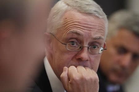 John Vickers, the head of the Independent Commission on Banking (ICB), listens during a news conference at the commissions headquarters in central London, September 12, 2011. REUTERS/Andrew Winning