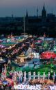 A view of the Oktoberfest beer festival from the giant ferris wheel in the fairground. The original Oktoberfest has inspired clones around the world, nearly all devoted to beer.