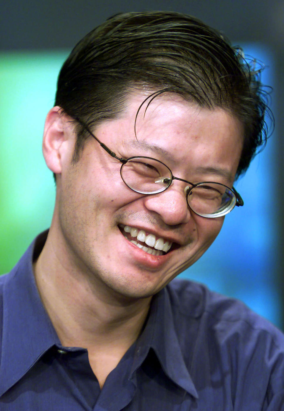 YAHOO CHIEF YANG SMILES AFTER LAUNCH OF YAHOO FINANCEVISION AT NASDAQ. <br> <br> See more photos of Jerry Yang on <a href="http://www.flickr.com/photos/yahooeditorspicks/galleries/72157628930649079/" rel="nofollow noopener" target="_blank" data-ylk="slk:Flickr;elm:context_link;itc:0;sec:content-canvas" class="link ">Flickr</a>