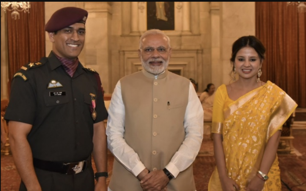 MS Dhoni and his wife Sakshi with PM Narendra Modi