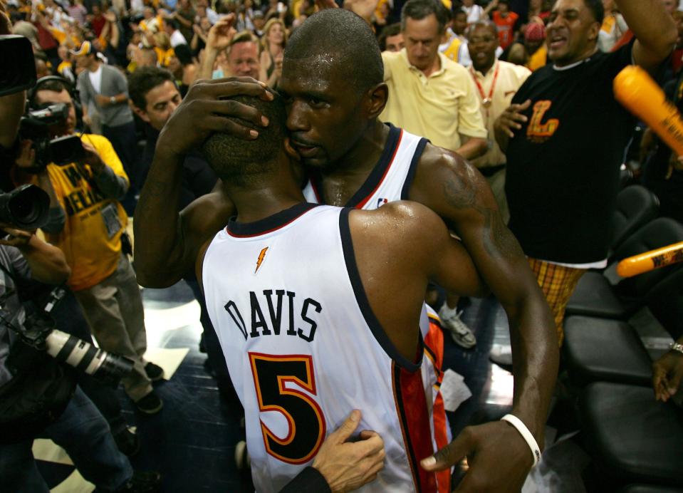 Baron Davis and Jason Richardson of the Golden State Warriors celebrate after defeating the Dallas Mavericks in Game 4 of the Western Conference first round during the 2007 NBA playoffs at Oracle Arena in Oakland, California. The eighth-seeded Warriors eliminated the No. 1 Dallas Mavericks in six games.